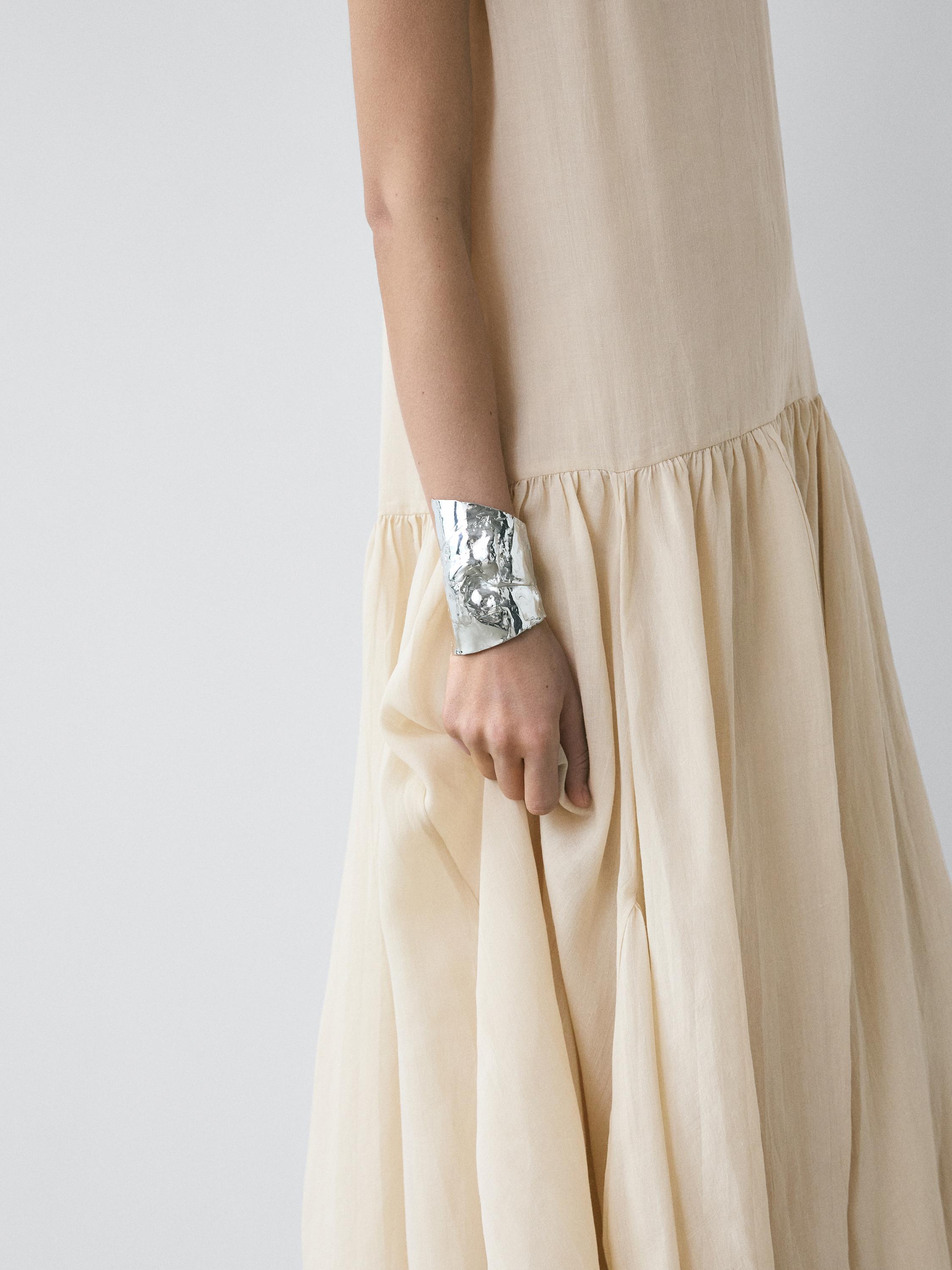 Flowing midi dress with pleated detail